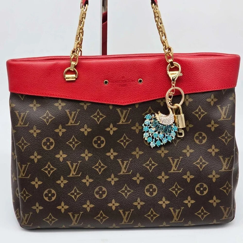 Authentic Louis Vuitton Lock & Key with unbranded Peacock Bagcharm, Keycharm